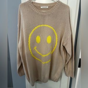 NWOT Urban Daisy sweater size M/L. Purchased from local boutique.
